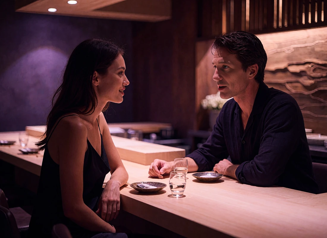 Couple seated at a chef counter sharing sake and small plates at an intimate Los Angeles restaurant